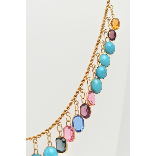 27 - A GEM AND PASTE FRINGE NECKLACE, the rope twist chain suspending oval turquoise cabochons and oval a... 