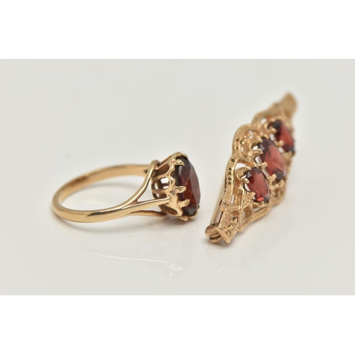 30 - A 9CT GOLD RING AND YELLOW METAL BROOCH, an oval cut garnet, prong set in yellow gold leading on to ... 