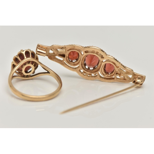 30 - A 9CT GOLD RING AND YELLOW METAL BROOCH, an oval cut garnet, prong set in yellow gold leading on to ... 