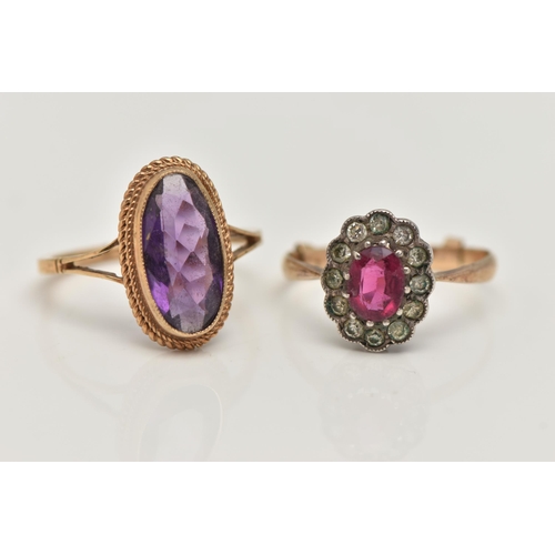 32 - TWO GEM SET RINGS, the first an elongated oval cut amethyst, collet set in yellow gold with rope twi... 