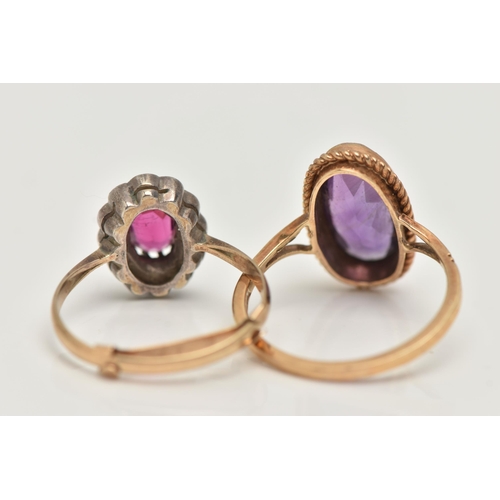 32 - TWO GEM SET RINGS, the first an elongated oval cut amethyst, collet set in yellow gold with rope twi... 