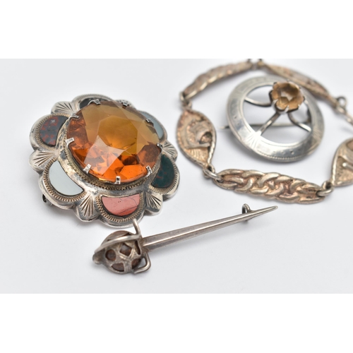 37 - AN ASSORTMENT OF SCOTTISH JEWELLERY, to include a silver brooch, set with a large circular cut orang... 