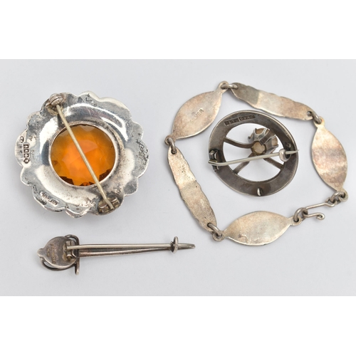 37 - AN ASSORTMENT OF SCOTTISH JEWELLERY, to include a silver brooch, set with a large circular cut orang... 