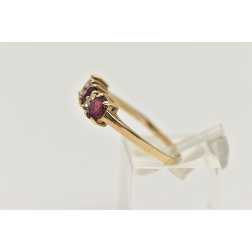 48 - A 9CT GOLD GARNET AND DIAMOND RING, with three oval cut garnets, each four claw set, interspaced wit... 