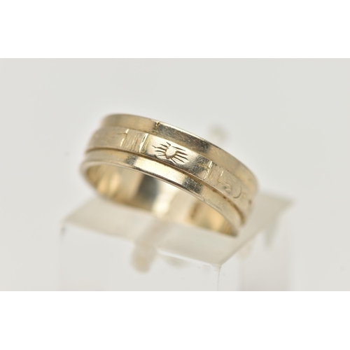 5 - A WHITE METAL WIDE BAND RING, decorated with an engraved central band, approximate band width 5.7mm,... 