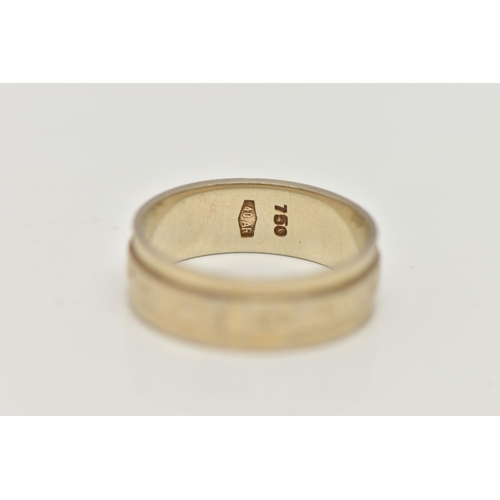 5 - A WHITE METAL WIDE BAND RING, decorated with an engraved central band, approximate band width 5.7mm,... 