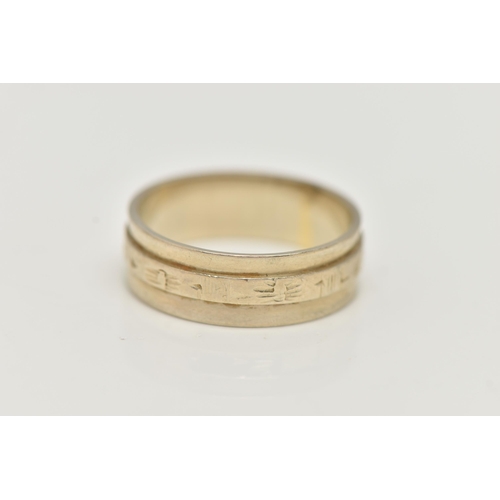 5 - A WHITE METAL WIDE BAND RING, decorated with an engraved central band, approximate band width 5.7mm,... 