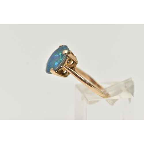 50 - A 9CT GOLD OPAL TRIPLET RING, the oval opal triplet in a four claw setting to the plain band, 9ct ha... 