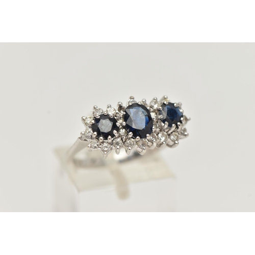 52 - AN 18CT WHITE GOLD SAPPHIRE AND DIAMOND RING, designed as a central oval sapphire flanked by circula... 