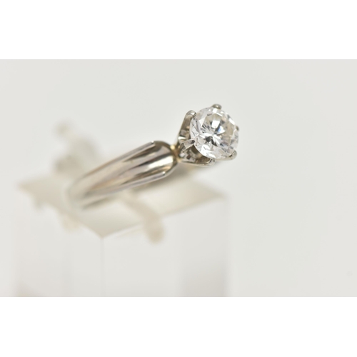 62 - A WHITE METAL SINGLE STONE DIAMOND RING, round brilliant cut diamond in a six claw setting, estimate... 