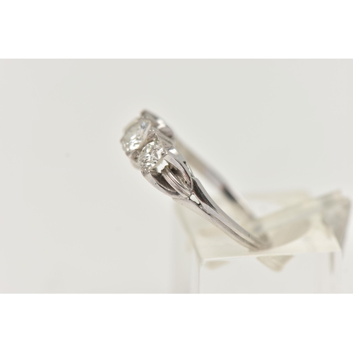 71 - A THREE STONE DIAMOND RING, a centrally set old European cut diamond with two round brilliant cut di... 