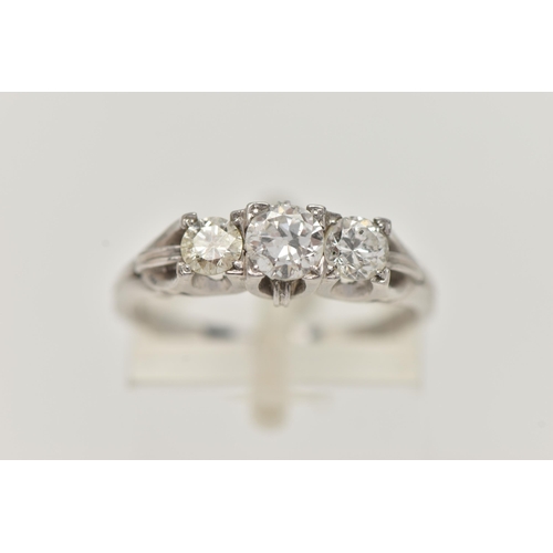 71 - A THREE STONE DIAMOND RING, a centrally set old European cut diamond with two round brilliant cut di... 