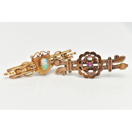 78 - TWO LATE VICTORIAN GEM SET BROOCHES, the first set with a central oval opal cabochon on a shield sha... 