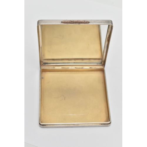 79 - A SILVER 1940S COMPACT, of a square form, engine turned pattern, gilt interior with mirror, hallmark... 