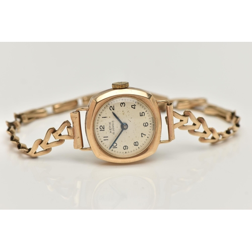 83 - A LADIES 9CT GOLD 'HEFIX 15 JEWELS' WRISTWATCH, manual wind, round silver dial signed 'Hefix', Arabi... 