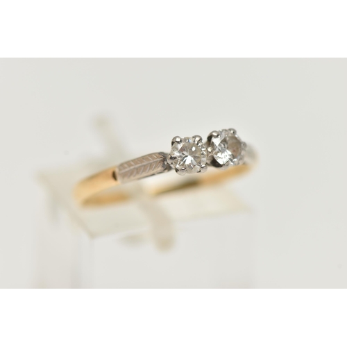 88 - A TWO STONE DIAMOND RING, two round brilliant cut diamonds prong set in white metal, approximate tot... 