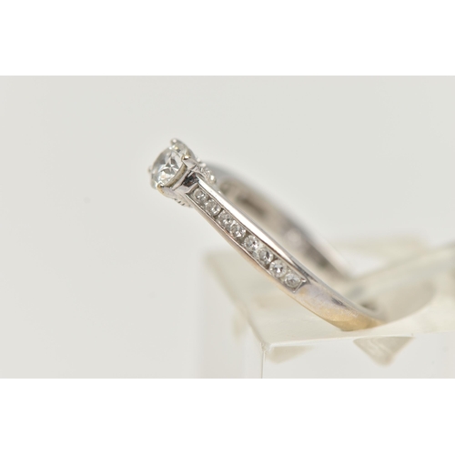 90 - A 'THE FOREVER DIAMOND' DIAMOND RING, a round brilliant cut diamond four prong set in white gold, le... 