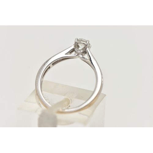 90 - A 'THE FOREVER DIAMOND' DIAMOND RING, a round brilliant cut diamond four prong set in white gold, le... 