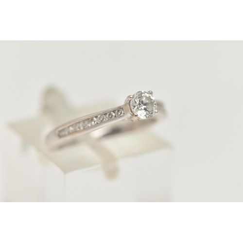 90 - A 'THE FOREVER DIAMOND' DIAMOND RING, a round brilliant cut diamond four prong set in white gold, le... 