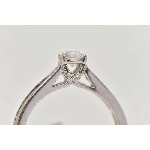 90 - A 'THE FOREVER DIAMOND' DIAMOND RING, a round brilliant cut diamond four prong set in white gold, le... 