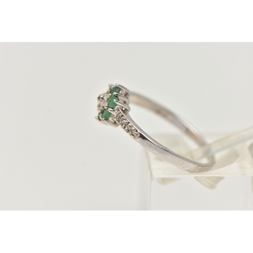 96 - A 9CT GOLD RING AND WHITE METAL PENDANT, the first an emerald and diamond floral cluster ring, hallm... 