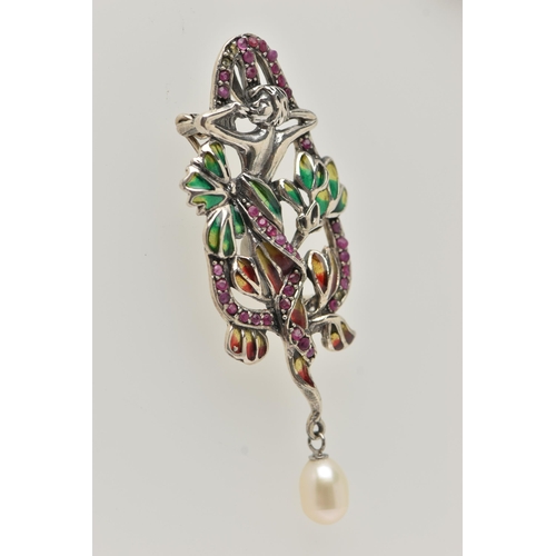 98 - A WHITE METAL PLIQUE A JOUR BROOCH, art nouveau style, displaying a lady within flowers, set within ... 