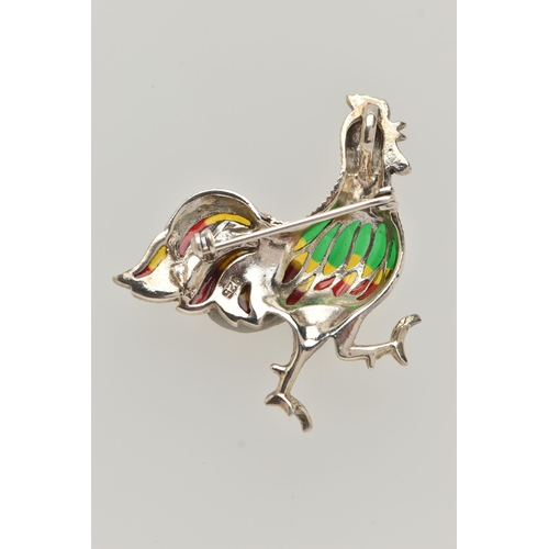 99 - A WHITE METAL PLIQUE A JOUR BROOCH, in the form of a cockerel, marcasite detail to the body with a r... 