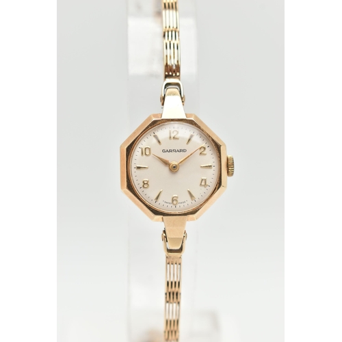 107 - A LADIES 9CT GOLD 'GARRARD' WRISTWATCH AND A NECKLACE, manual wind, round silver dial signed 'Garrar... 