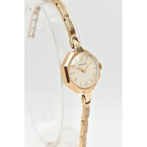 107 - A LADIES 9CT GOLD 'GARRARD' WRISTWATCH AND A NECKLACE, manual wind, round silver dial signed 'Garrar... 