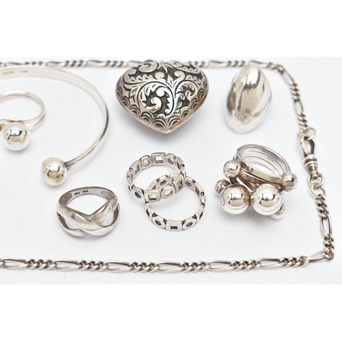 114 - A SELECTION OF SILVER AND WHITE METAL JEWELLERY, to include six rings, a heart pendant, a torque ban... 