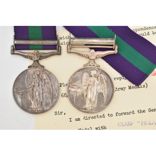 127 - TWO MALAYA MEDALS, one with box and loose ribbon, awarded to '2298817 PTE H.G.Roberts R.A.M.C', sign... 