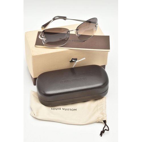 130 - A BOXED PAIR OF 'LOUIS VUITTON' RIMLESS SUNGLASSES, laser cut pattern to the edge of the graduated t... 