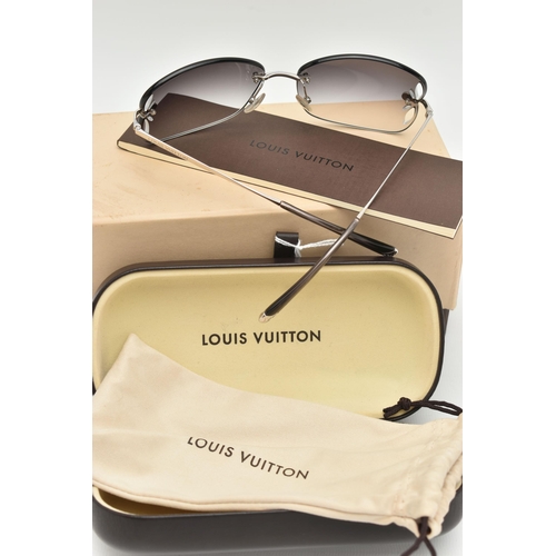 130 - A BOXED PAIR OF 'LOUIS VUITTON' RIMLESS SUNGLASSES, laser cut pattern to the edge of the graduated t... 