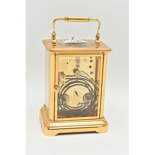 133 - A BRASS 'MATTHEW NORMAN' CARRIAGE CLOCK, with repeat mechanism, white enamel dial,  black Roman nume... 