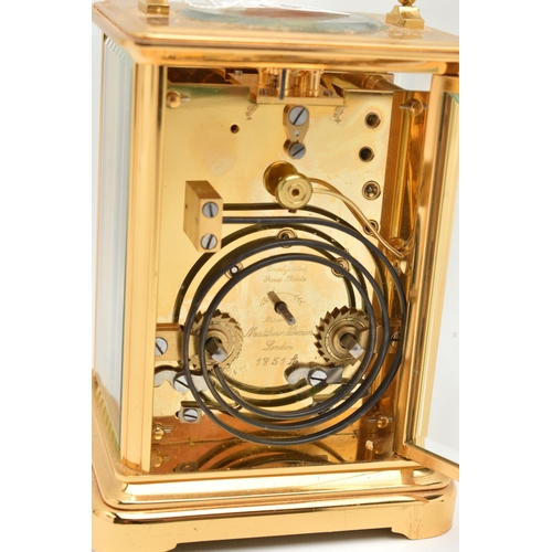 133 - A BRASS 'MATTHEW NORMAN' CARRIAGE CLOCK, with repeat mechanism, white enamel dial,  black Roman nume... 