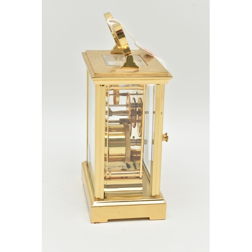 134 - A BRASS 'WOODFORD' CARRIAGE CLOCK, white dial signed 'Woodford Est.1860', Roman numerals, blue steel... 