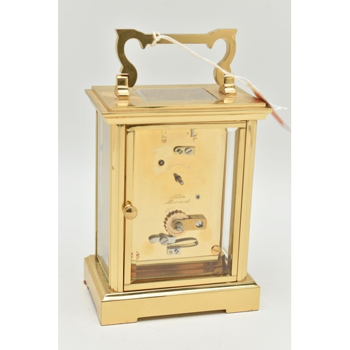 134 - A BRASS 'WOODFORD' CARRIAGE CLOCK, white dial signed 'Woodford Est.1860', Roman numerals, blue steel... 