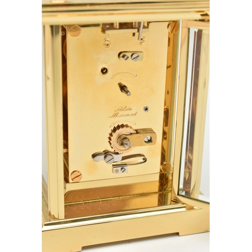 134 - A BRASS 'WOODFORD' CARRIAGE CLOCK, white dial signed 'Woodford Est.1860', Roman numerals, blue steel... 