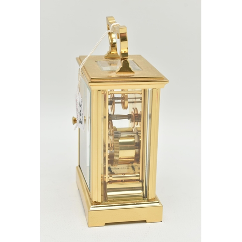 134 - A BRASS 'WOODFORD' CARRIAGE CLOCK, white dial signed 'Woodford Est.1860', Roman numerals, blue steel... 