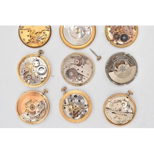 138 - A BOX OF WATCH MOVEMENTS, fifteen movements, names to include Garrard, Smiths, J.W Benson, Roamer, a... 