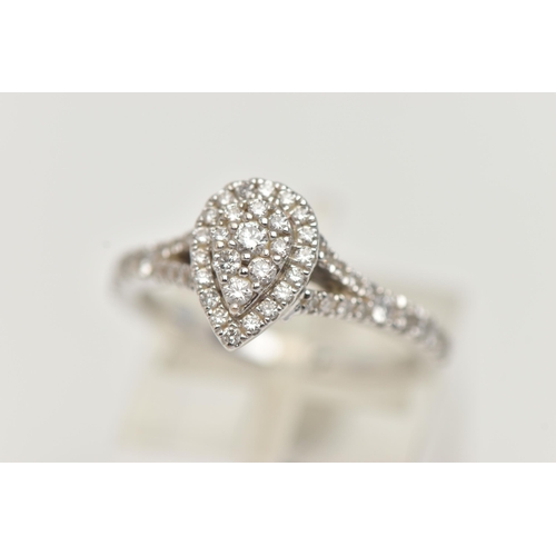 149 - A 'VERA WANG', 18CT WHITE GOLD, DIAMOND SET RING, of a pear cut design, set with a cluster of round ... 