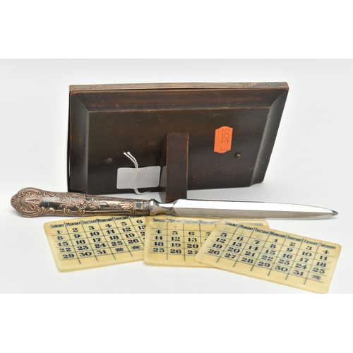 160 - A GEORGE V SILVER MOUNTED SHAGREEN PERPETUAL DESK CALENDAR OF RECTANGULAR FORM, with seven double si... 