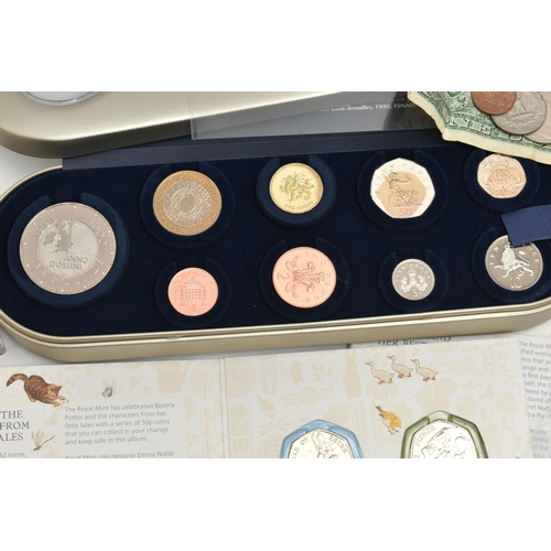 167 - A CARDBOARD BOX CONTAINING MIXED COINAGE, to include a Royal Mint 2000 Time Capsule of Penny to £5 o... 