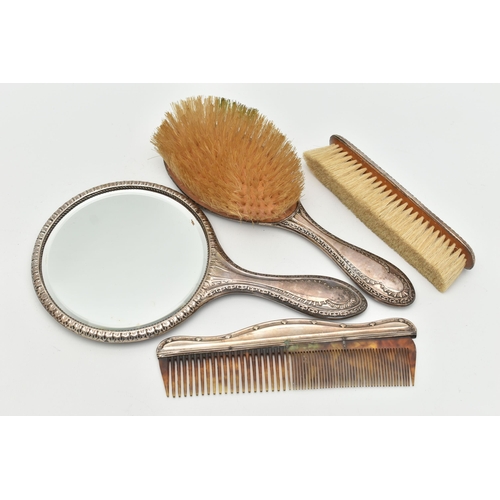 171 - AN EARLY 2OTH CENTURY SILVER DRESSING TABLE SET AND A COMB, the set including a mirror and two brush... 