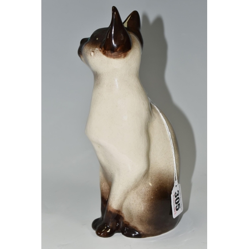 305 - A WINSTANLEY POTTERY FIGURE OF A SIAMESE CAT, with bright blue glass eyes, signed 'Winstanley, Kensi... 