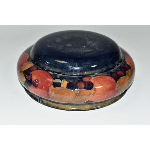 306 - A MOORCROFT POTTERY POMEGRANATE BOWL, decorated with pomegranates on a mottled blue ground, impresse... 