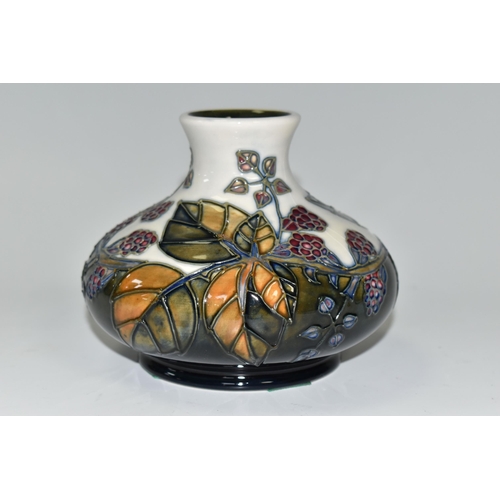 310 - A MOORCROFT POTTERY 'BRAMBLE' VASE, of squat baluster form, having tube lined brambles and berries o... 