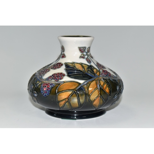 310 - A MOORCROFT POTTERY 'BRAMBLE' VASE, of squat baluster form, having tube lined brambles and berries o... 