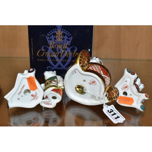 311 - A BOXED ROYAL CROWN DERBY 'DRUMMER BEAR' PAPERWEIGHT AND THREE MINIATURE TEDDIES FIGURES, comprising... 