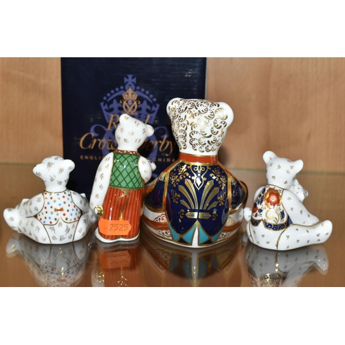 311 - A BOXED ROYAL CROWN DERBY 'DRUMMER BEAR' PAPERWEIGHT AND THREE MINIATURE TEDDIES FIGURES, comprising... 